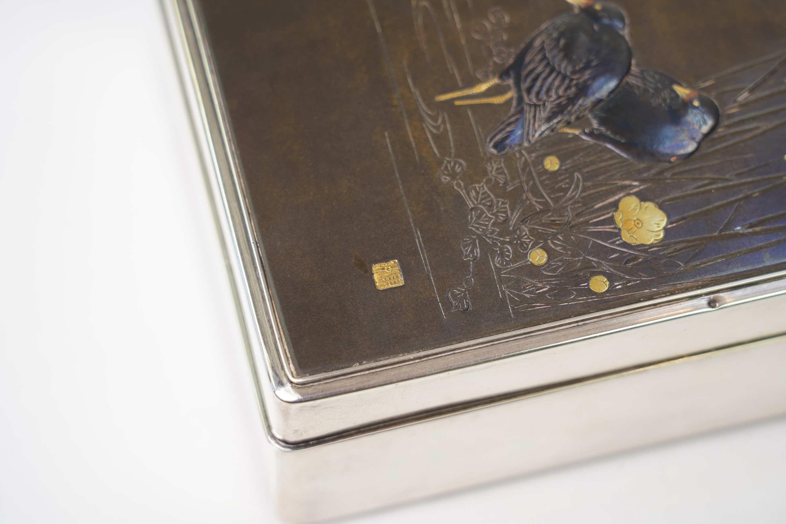 A Japanese shibuichi and shakudo mounted silver box and cover, Taisho period